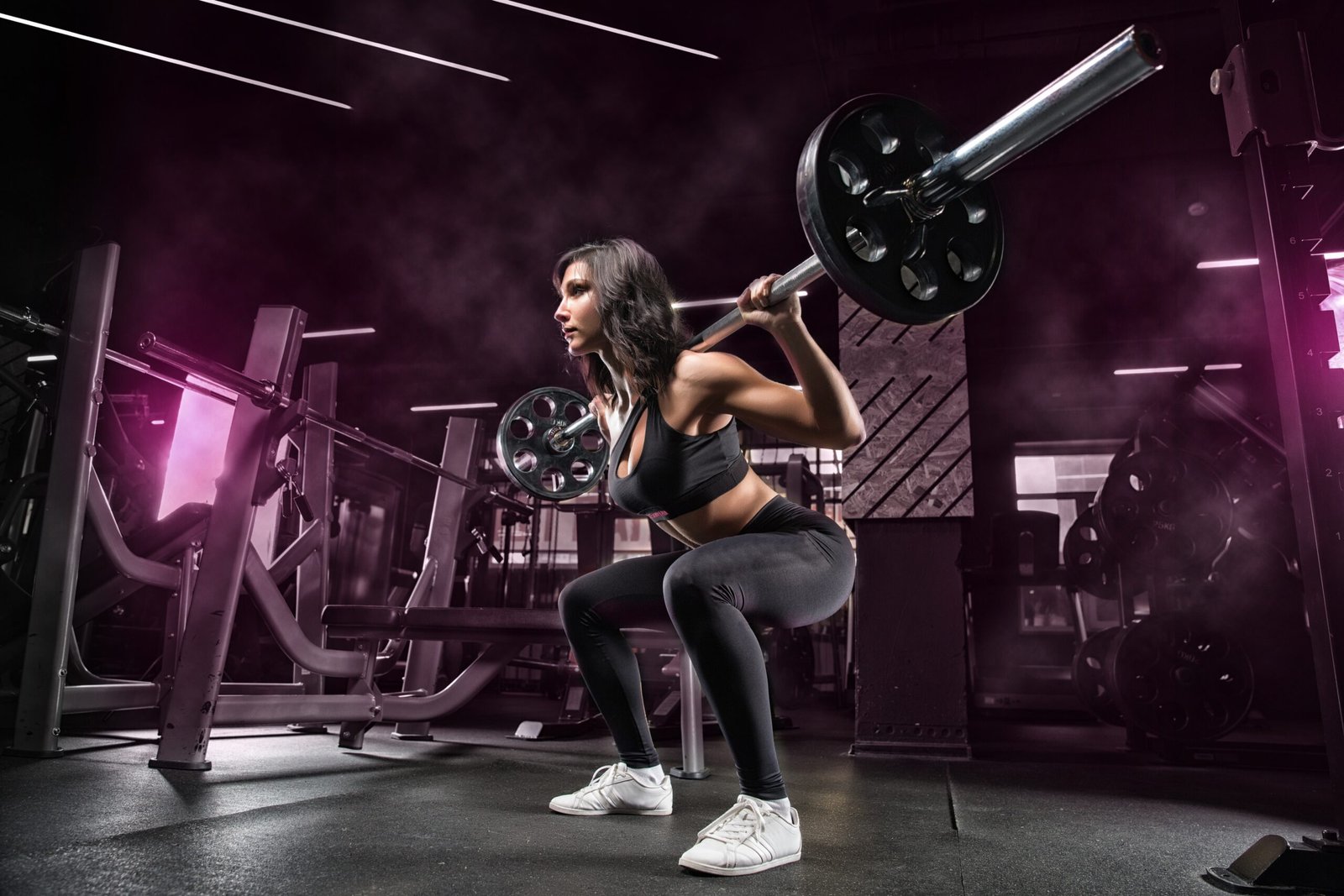 2020_Weightlifter_girl_lifts_the_barbell_in_the_gym_144823_-scaled-1